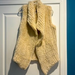 Luxury. Faux fur vest. Minimally worn. No defects